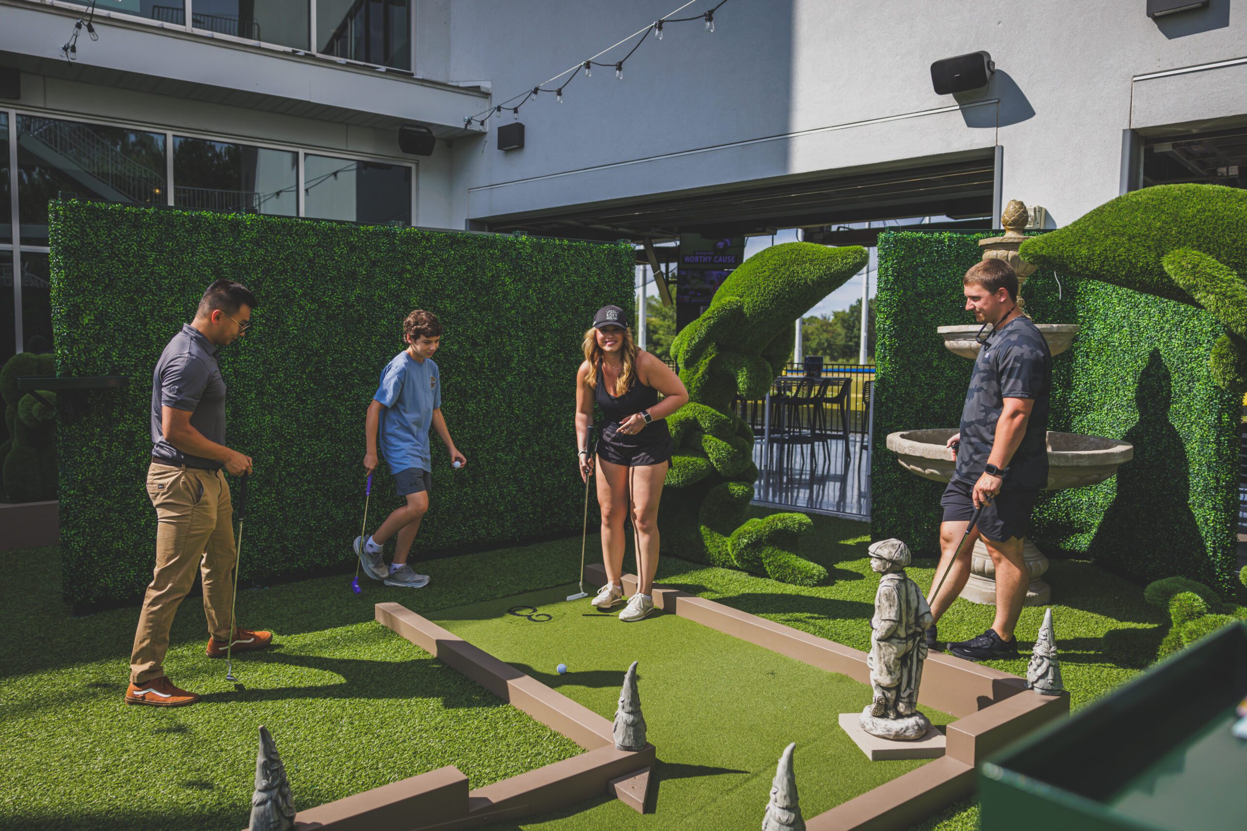 Dynamic sculpture at the Art Garden Mini Golf Course, commanding attention with its bold form and artistic expression amidst the playful terrain.