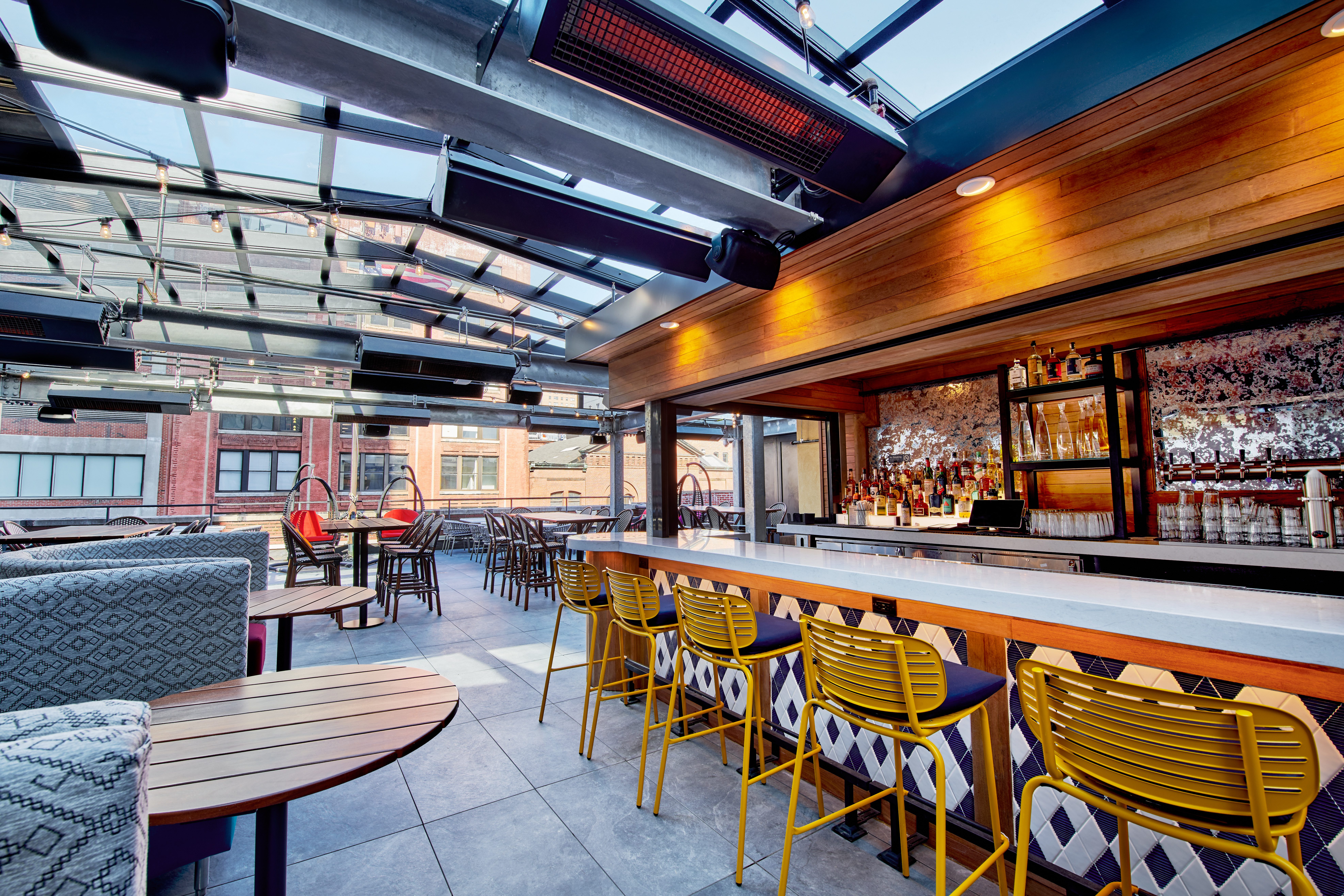 http://skyline,%20rooftop,%20views,%20soft%20seating,%20comfy%20seating,%20outdoor%20seating,%20rooftop%20bar%20seating